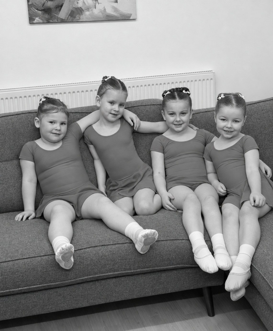 Four young LHTS dancers sitting together on the sofa in the breakout room